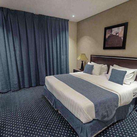 Onizah Hotel Unaizah Buitenkant foto