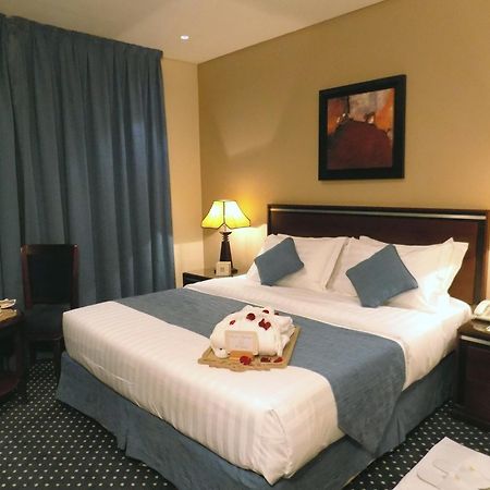 Onizah Hotel Unaizah Kamer foto