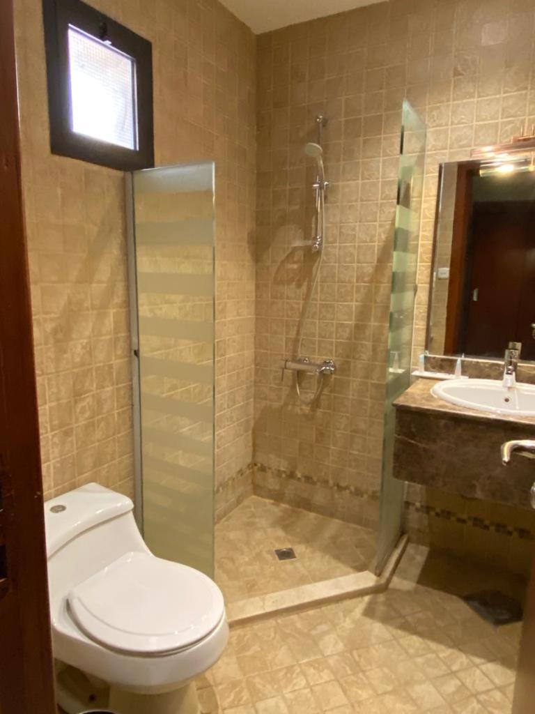 Onizah Hotel Unaizah Buitenkant foto