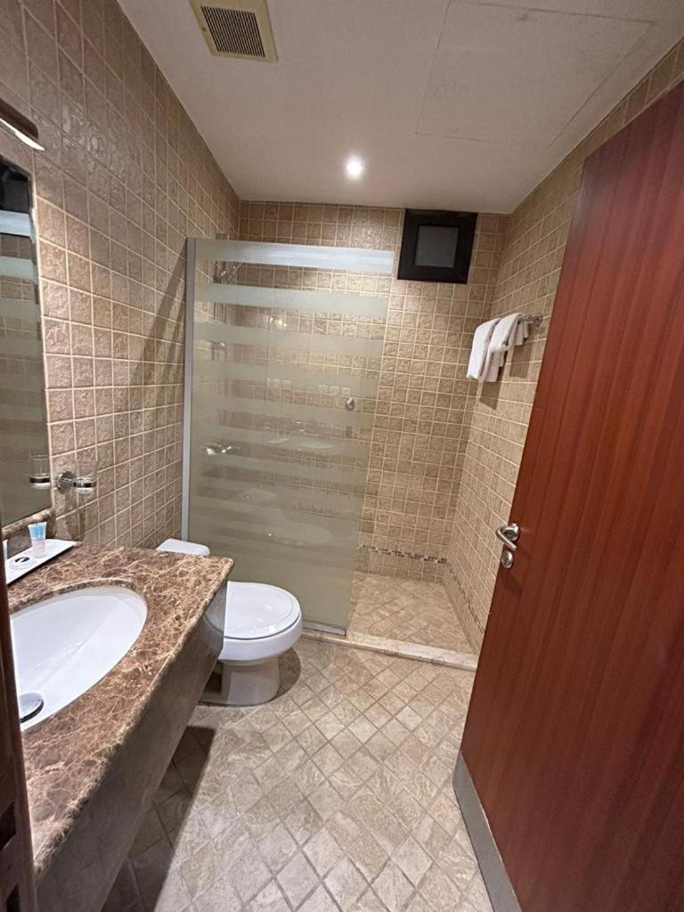 Onizah Hotel Unaizah Buitenkant foto