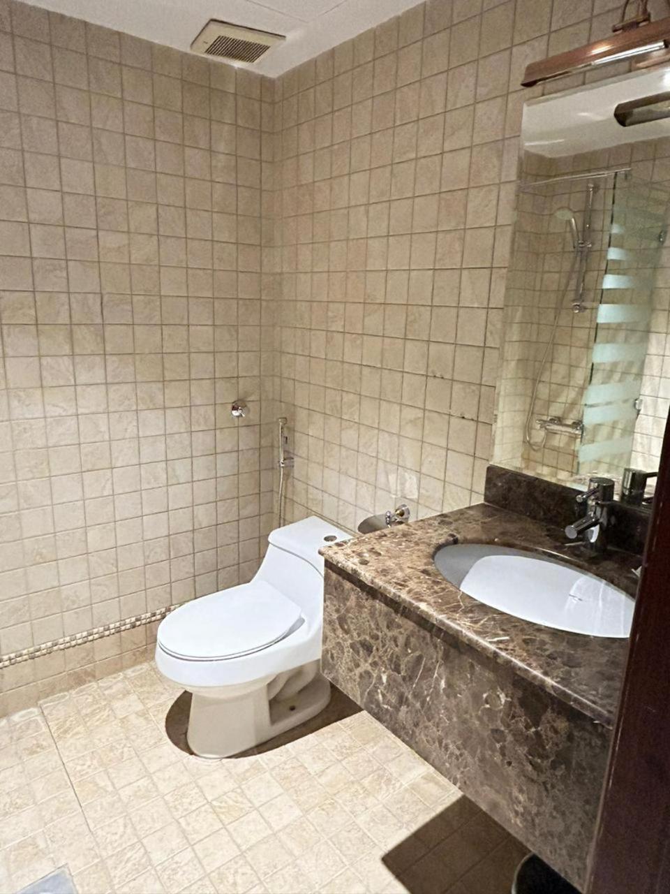 Onizah Hotel Unaizah Buitenkant foto