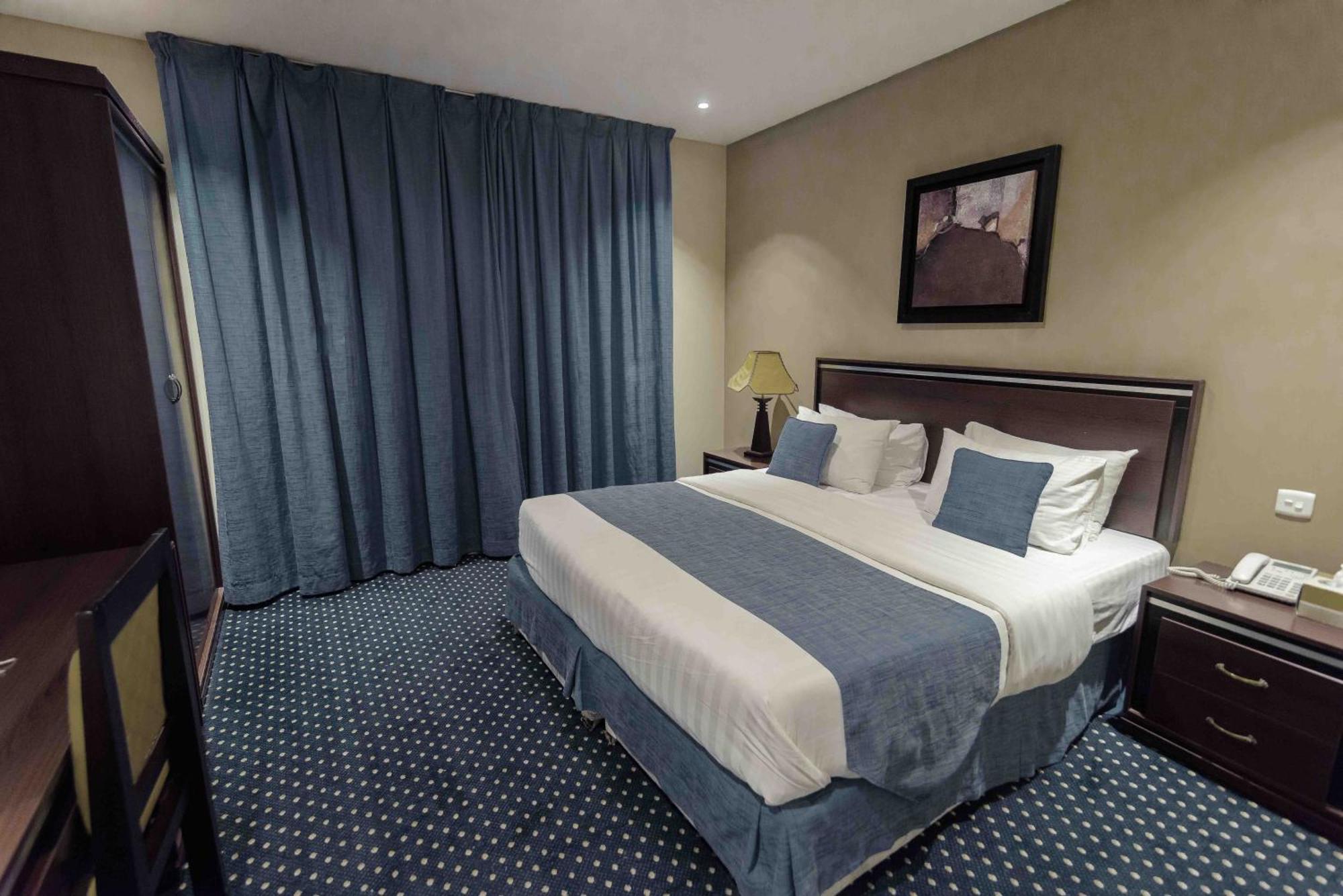 Onizah Hotel Unaizah Buitenkant foto