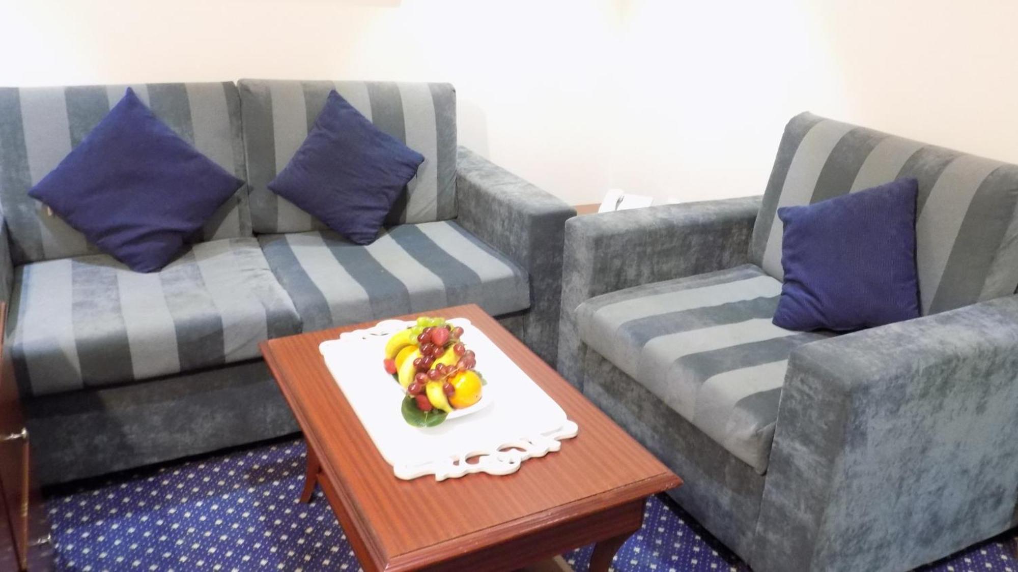 Onizah Hotel Unaizah Kamer foto