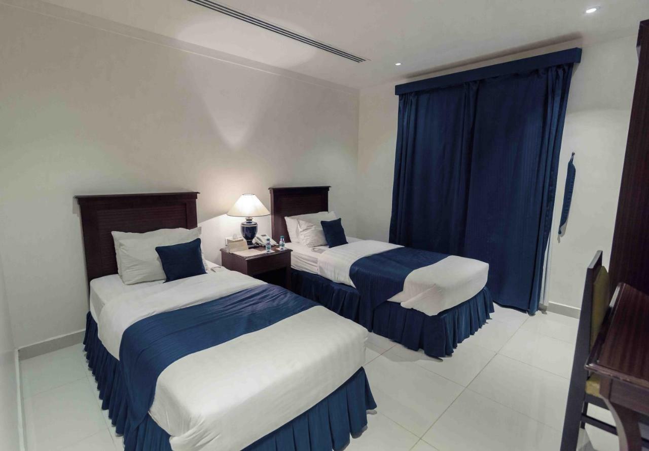 Onizah Hotel Unaizah Buitenkant foto