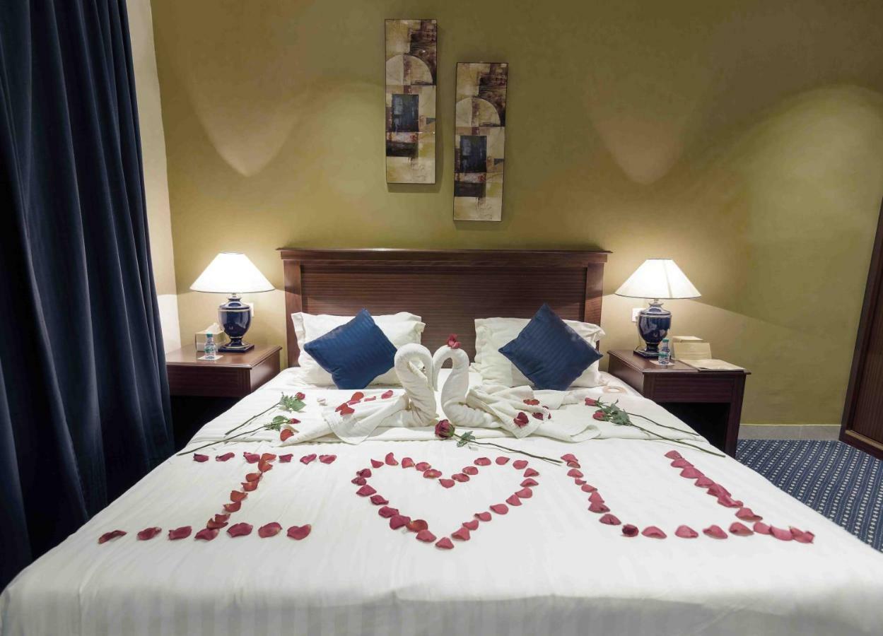 Onizah Hotel Unaizah Buitenkant foto